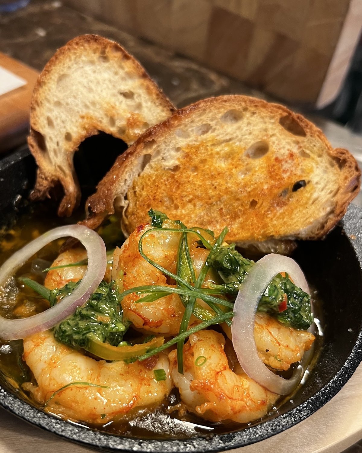 Garlic and chilli prawns with sourdough at Tram Coffee & Wine